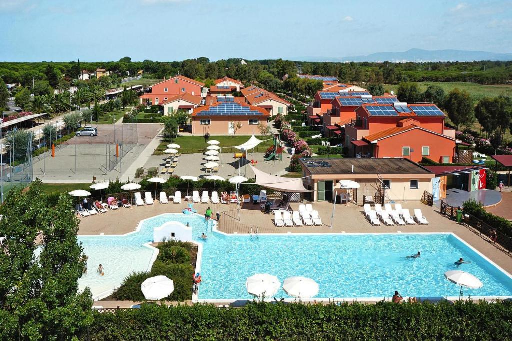 an aerial view of a resort with a large swimming pool at Apartment in Vada near restaurants in La Cinquantina