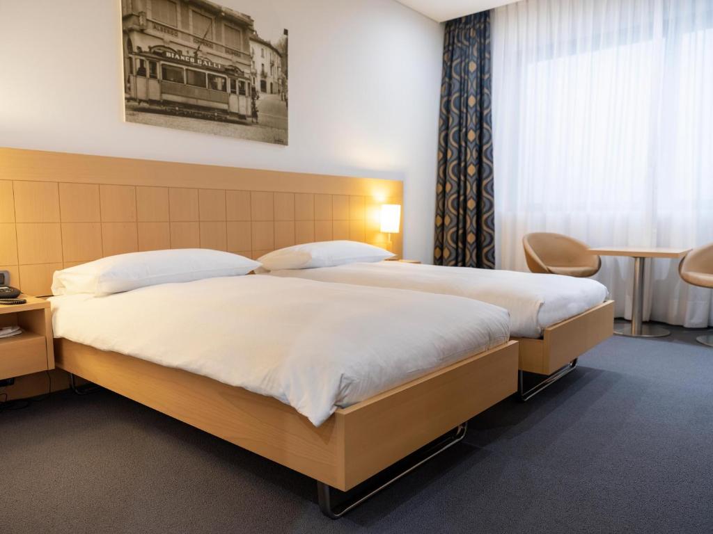 Letto o letti in una camera di Hotel Coronado
