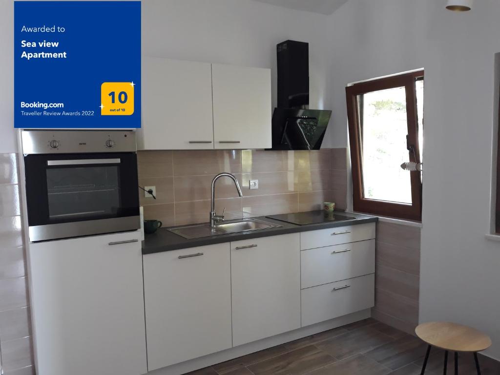 Kuchyňa alebo kuchynka v ubytovaní Sea view Apartment