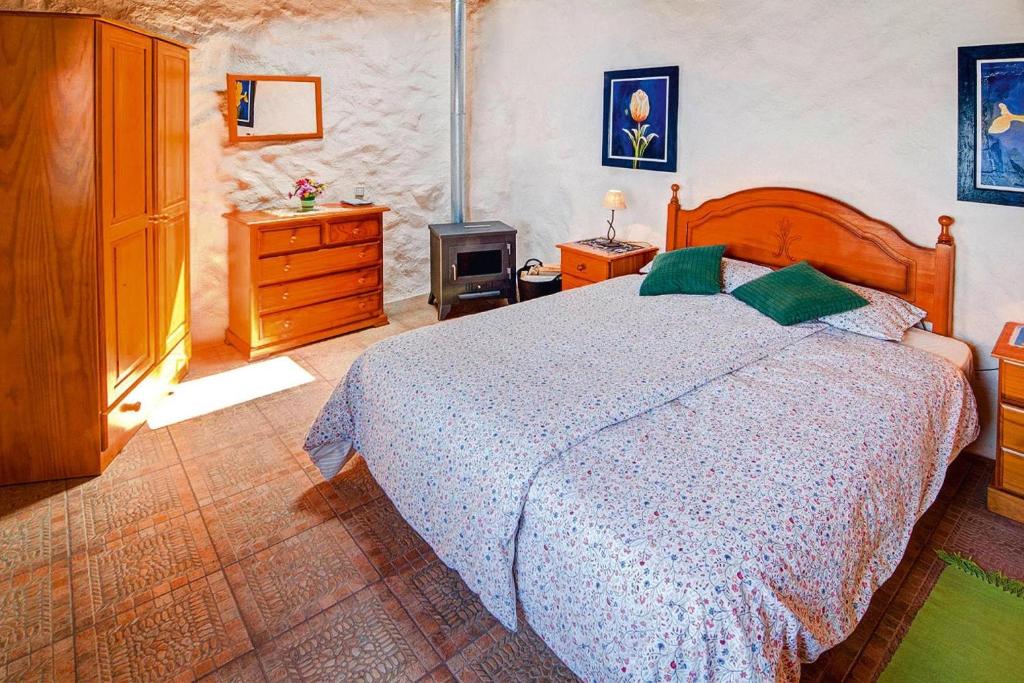 A bed or beds in a room at Finca La Hoya, El Tanque