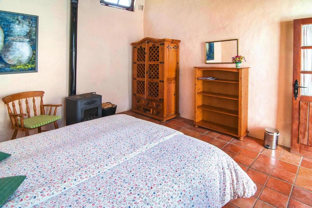 A bed or beds in a room at Finca La Hoya, El Tanque