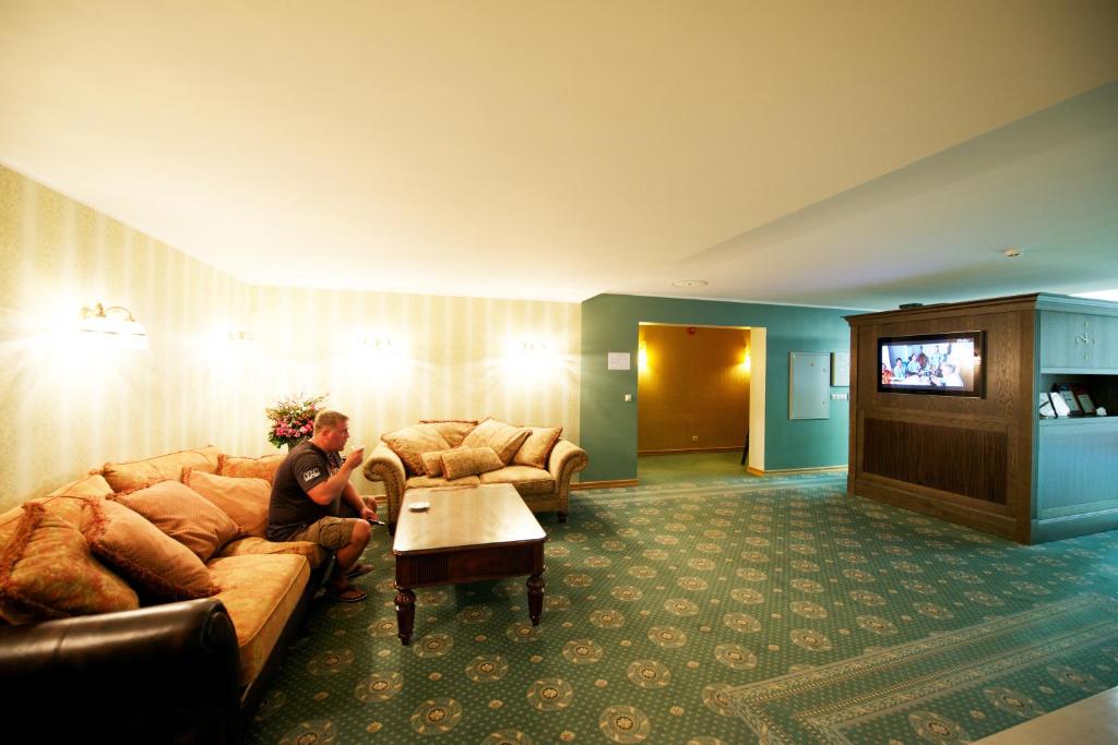 TV a/nebo společenská místnost v ubytování Villa Hotel Theresa