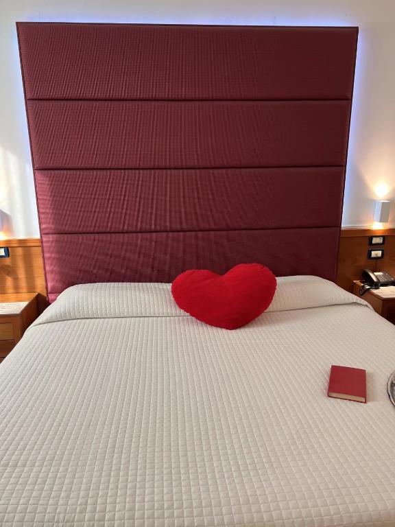 Postel nebo postele na pokoji v ubytování Venice Hotel