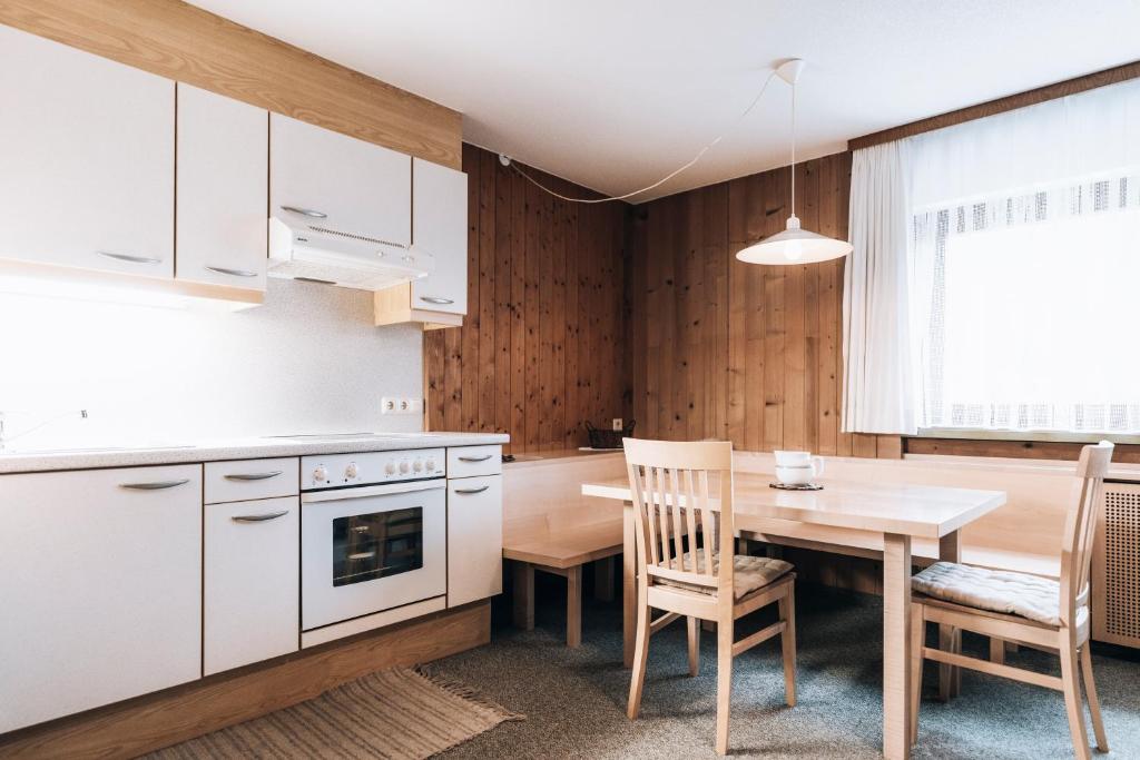 Kuchyň nebo kuchyňský kout v ubytování Gästehaus Lässer