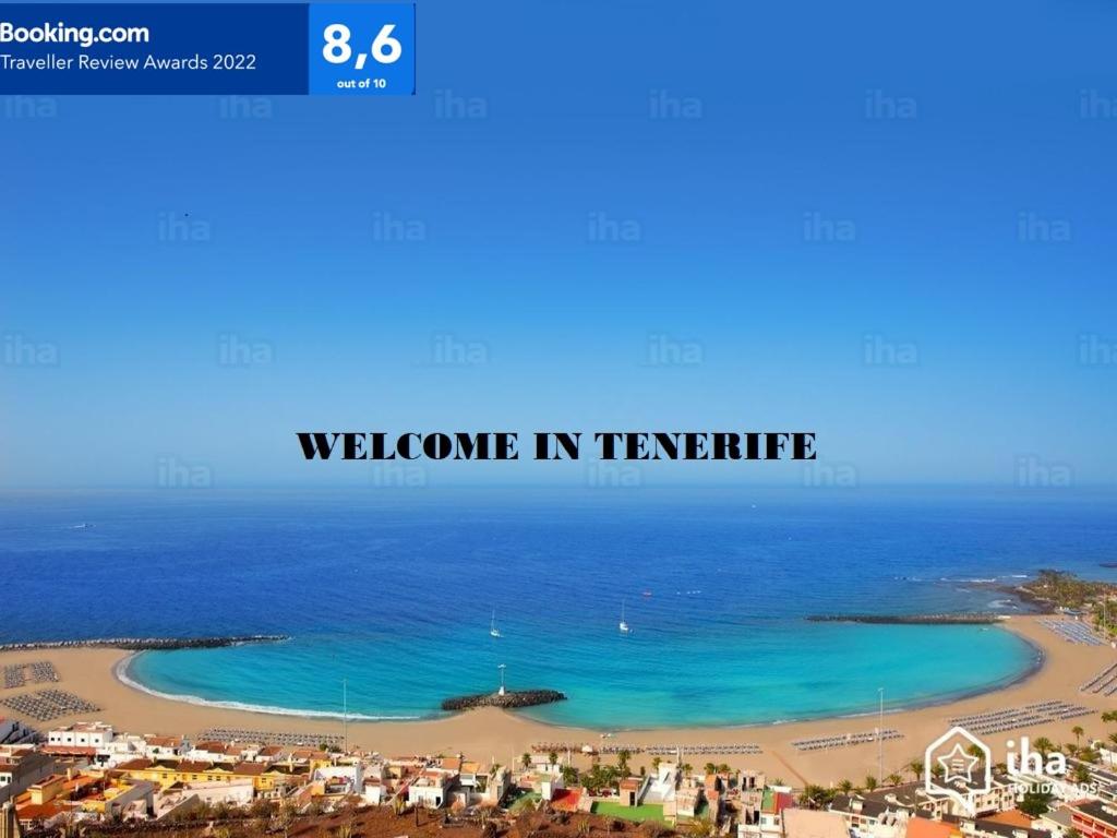 ロス・クリスティアーノスにあるLos Cristianos Port Royale 157の「テリアへようこそ」という言葉が書かれたビーチの景色