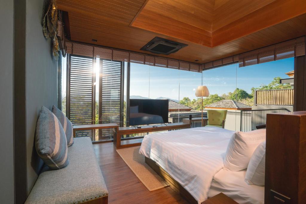 TV a/nebo společenská místnost v ubytování AKRA Collection Layan - Hideaway Villas