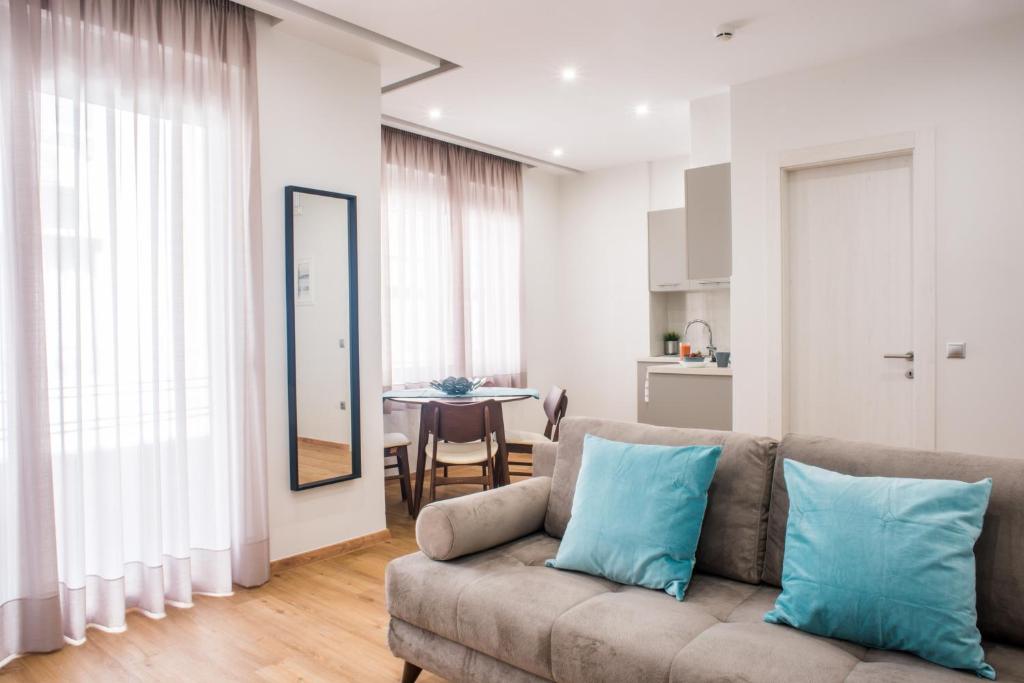 A seating area at A23 Premium suite with balcony near Parthenon