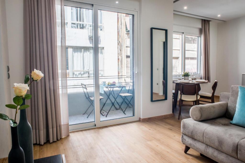 A seating area at A23 Premium suite with balcony near Parthenon