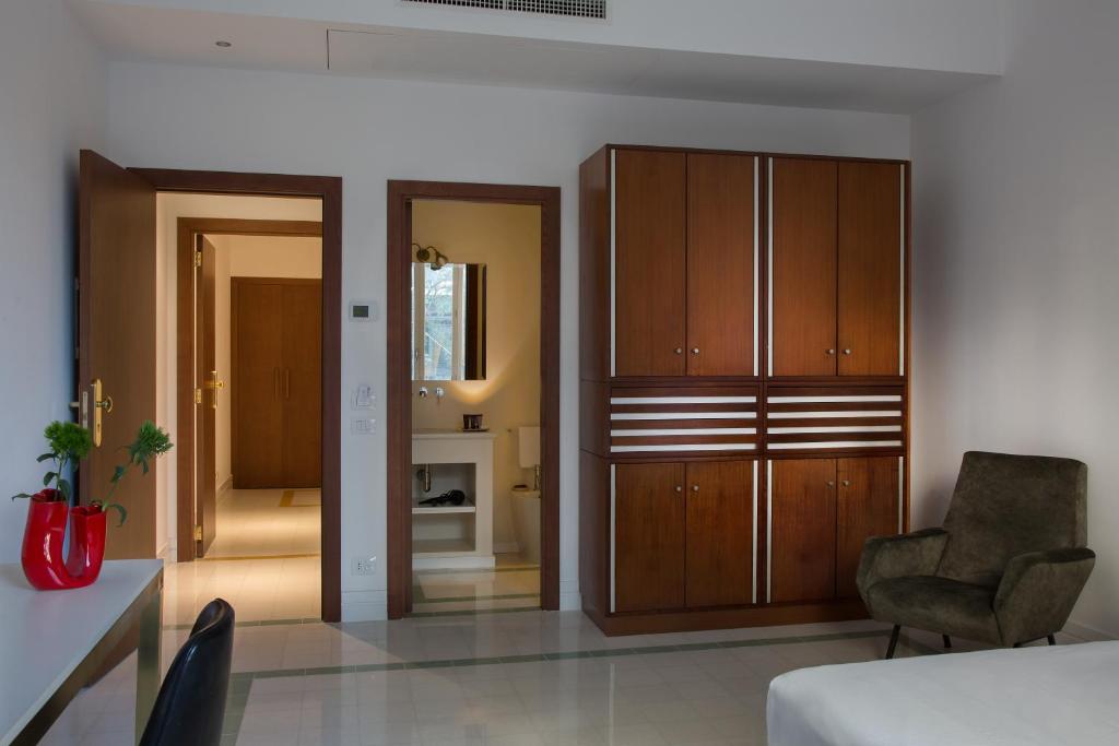 Łóżko lub łóżka w pokoju w obiekcie Corso Novara 5 Design Apartments