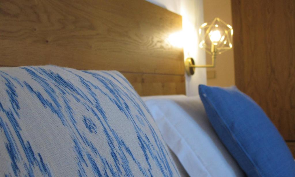 Posteľ alebo postele v izbe v ubytovaní Boutique Hotel Petit Sant Miquel