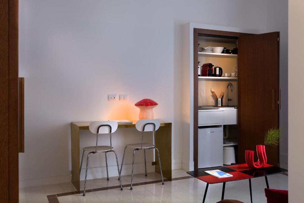 Kuchnia lub aneks kuchenny w obiekcie Corso Novara 5 Design Apartments