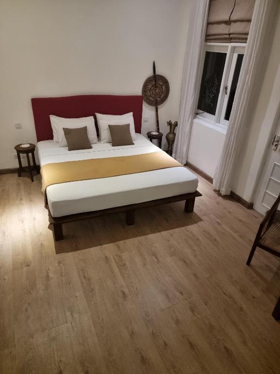 Postel nebo postele na pokoji v ubytování Artisan Villa