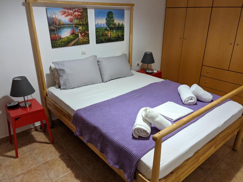 Postel nebo postele na pokoji v ubytování House of Polymnia
