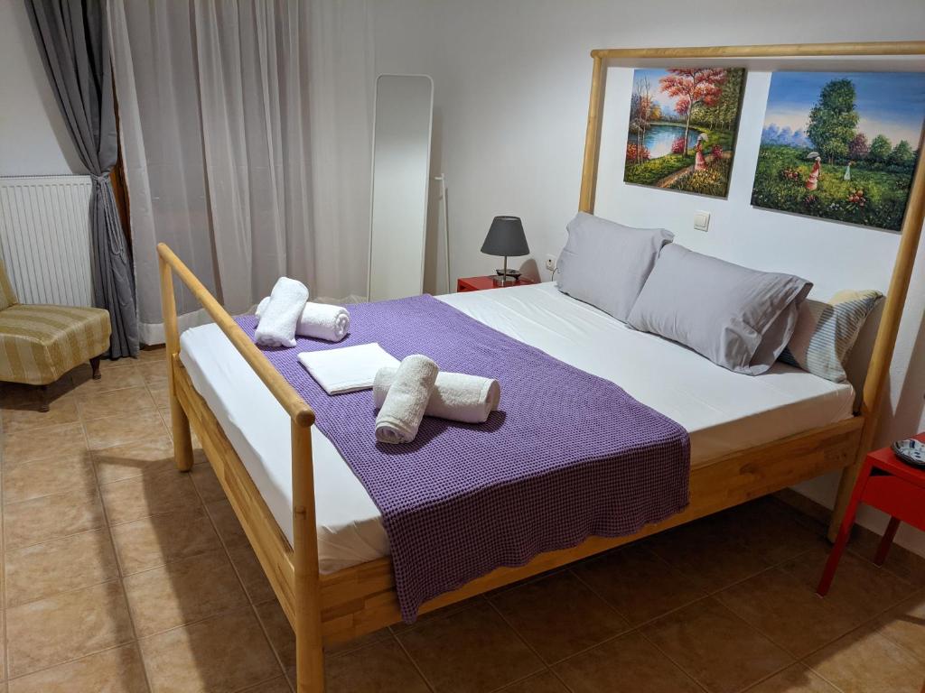 Postel nebo postele na pokoji v ubytování House of Polymnia