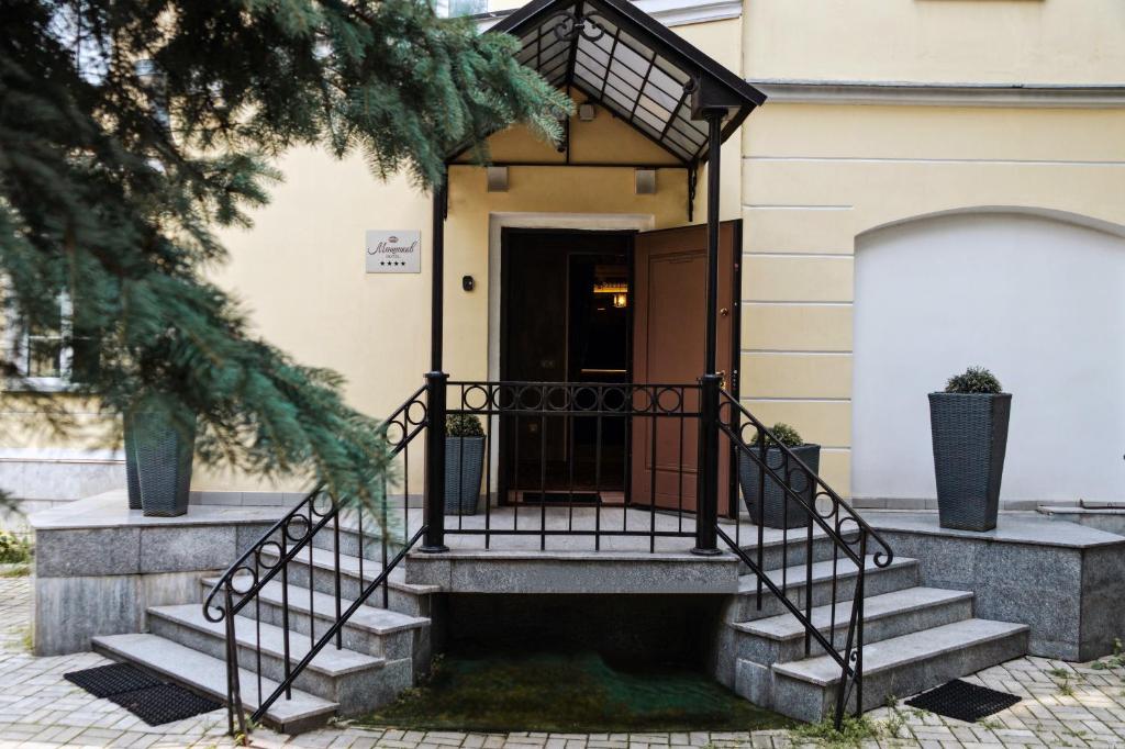 a set of stairs leading to a house at Menshicov Boutique Hotel in Moscow