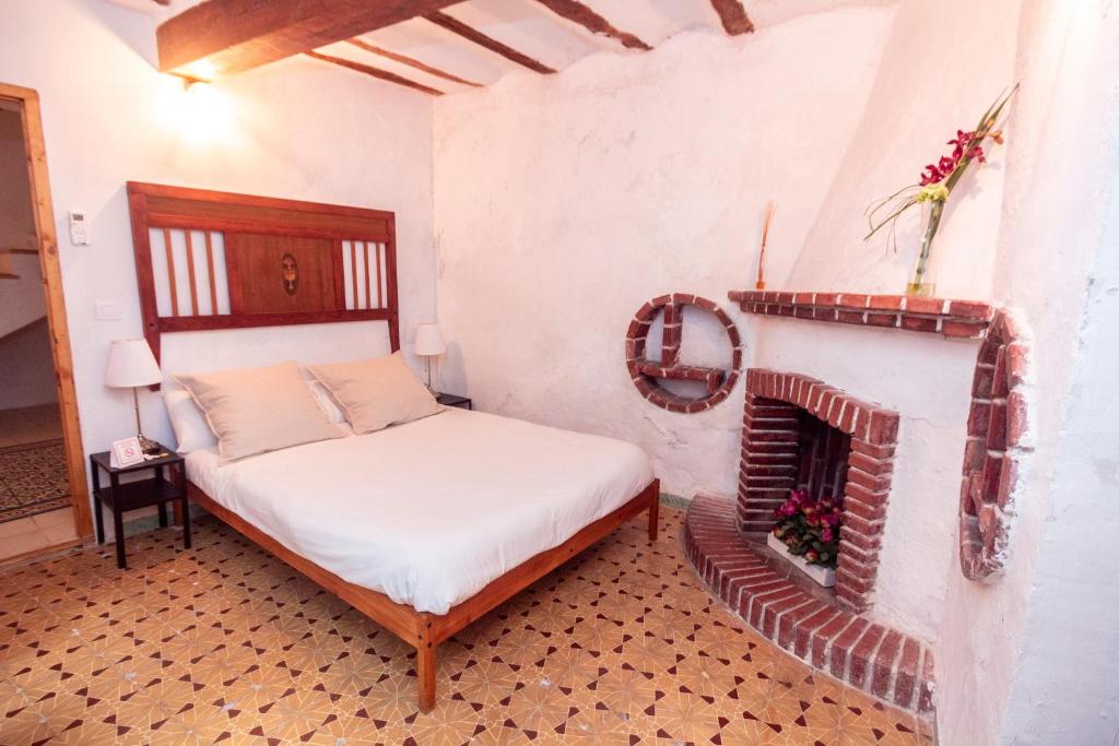 Postel nebo postele na pokoji v ubytování La Casa de Félix