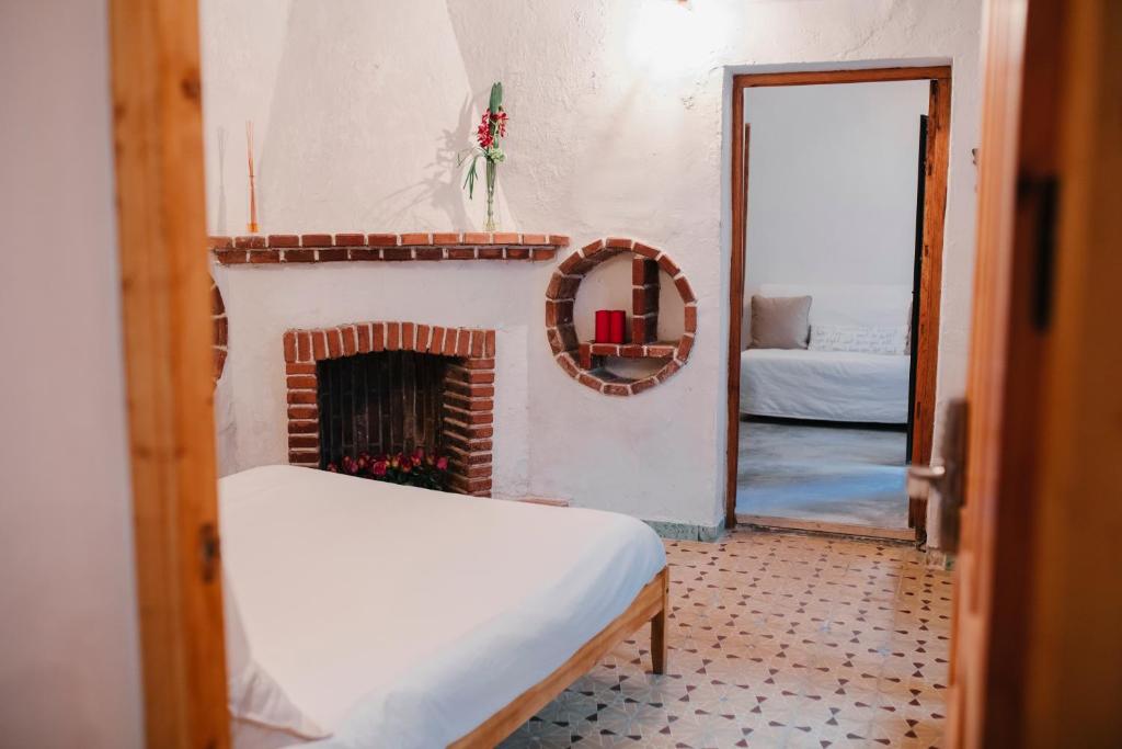 Postel nebo postele na pokoji v ubytování La Casa de Félix
