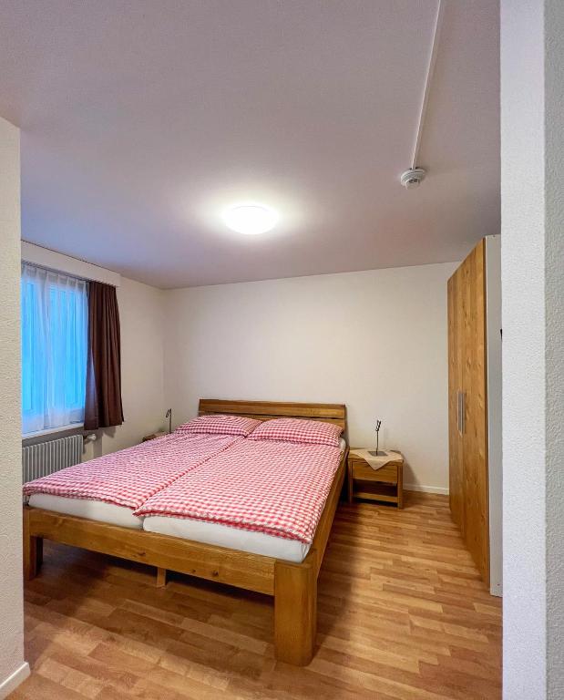 Postel nebo postele na pokoji v ubytování Hotel Hecht