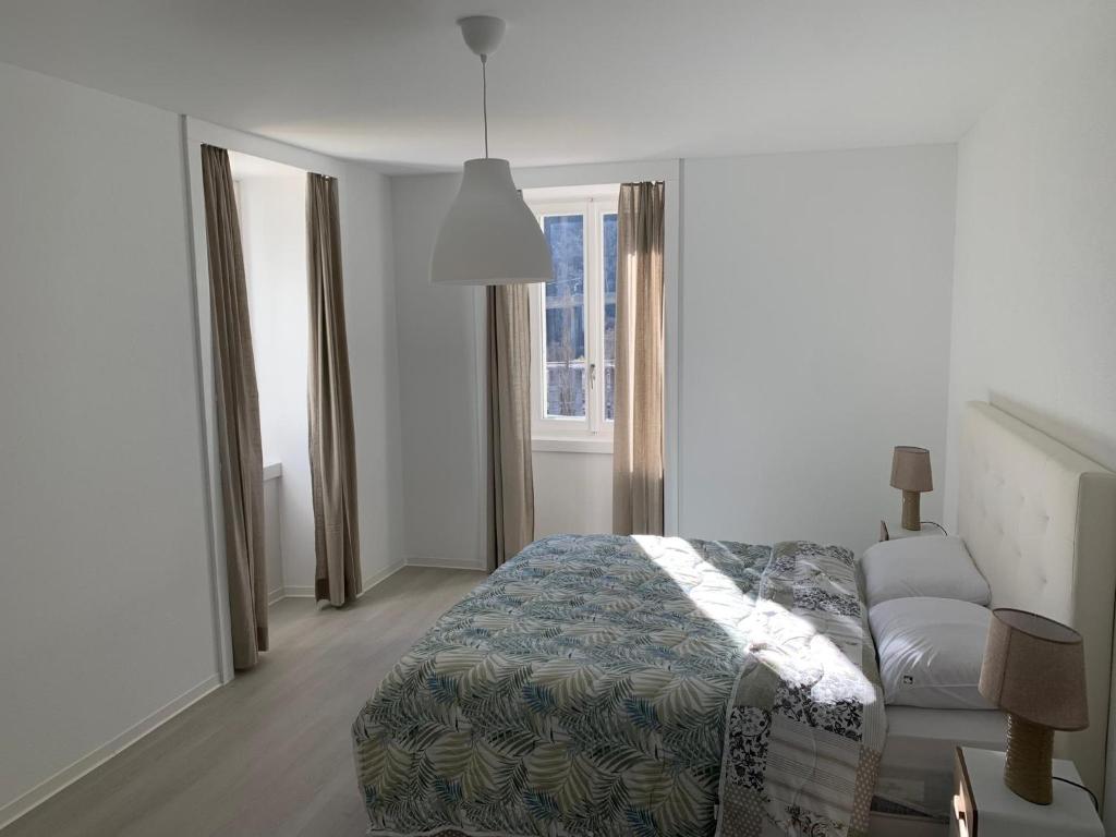 Postel nebo postele na pokoji v ubytování Casa Cattaneo