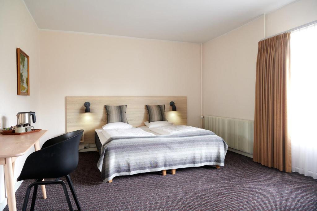 Postel nebo postele na pokoji v ubytování Montra Hotel Hanstholm