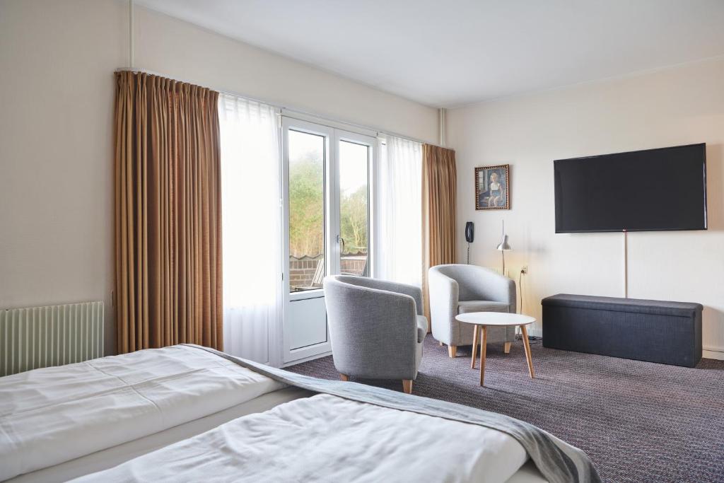 TV a/nebo společenská místnost v ubytování Montra Hotel Hanstholm
