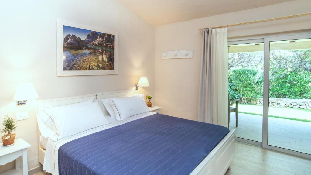 Postel nebo postele na pokoji v ubytování Hotel Nibaru