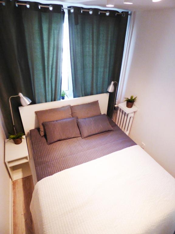 Posteľ alebo postele v izbe v ubytovaní Plac Grzybowski Apartment