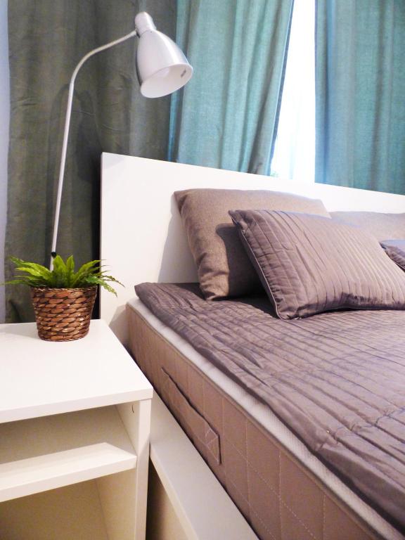 Posteľ alebo postele v izbe v ubytovaní Plac Grzybowski Apartment