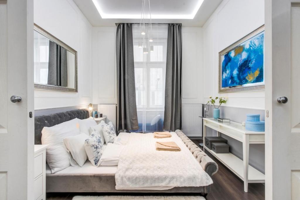 Postel nebo postele na pokoji v ubytování A5 Apáczai Apartment