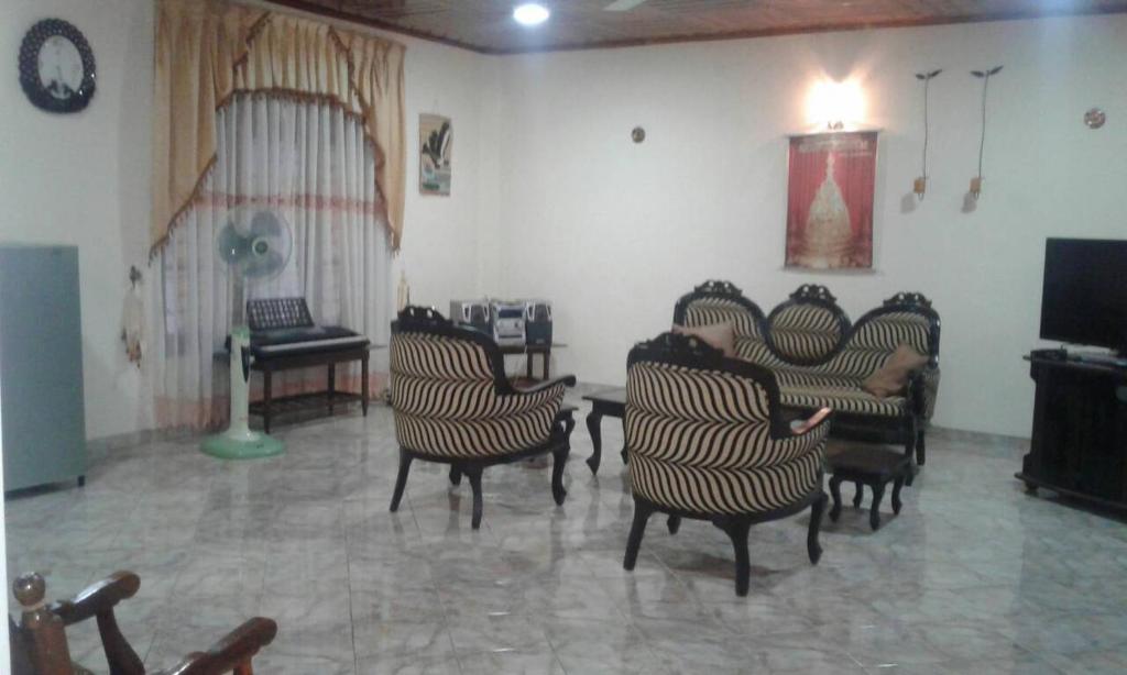 Posezení v ubytování Jaya Home Stay