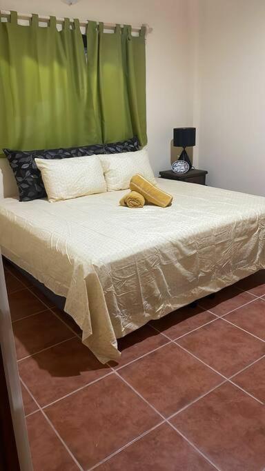 Postel nebo postele na pokoji v ubytování Casa SanMar cerca de la playa