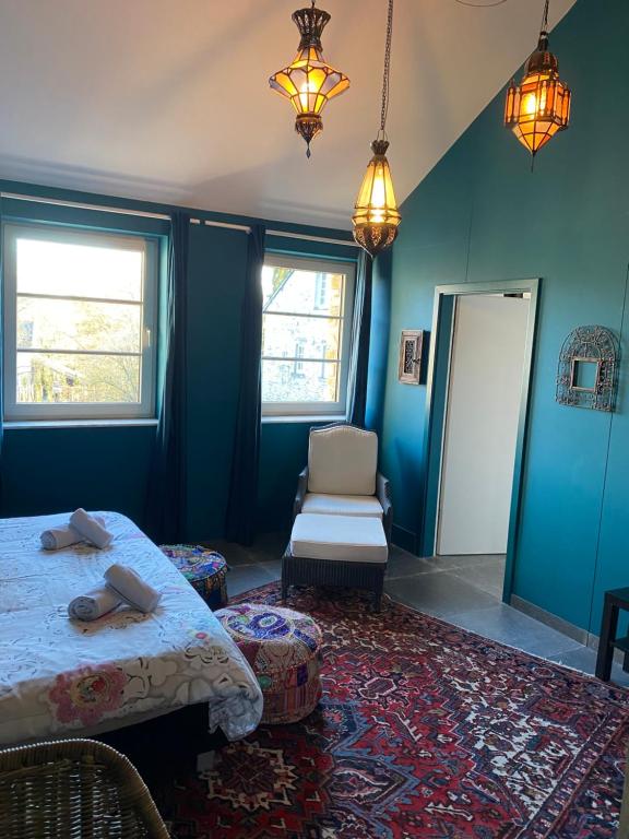 Un ou plusieurs lits dans un hébergement de l'établissement Maison Jules