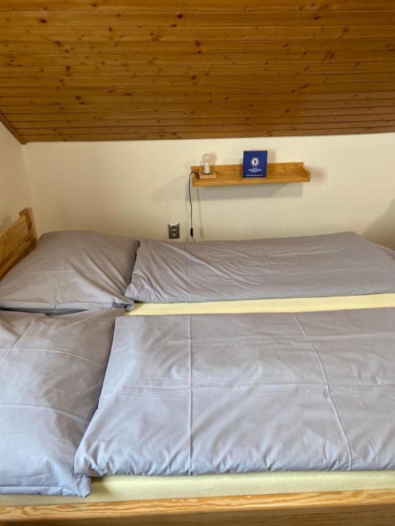 Postel nebo postele na pokoji v ubytování Relax Centrum Gól