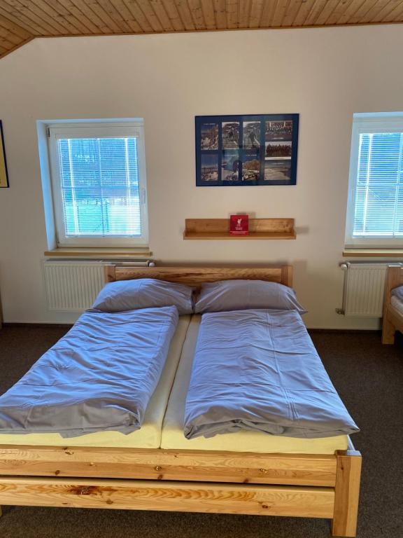 Postel nebo postele na pokoji v ubytování Relax Centrum Gól