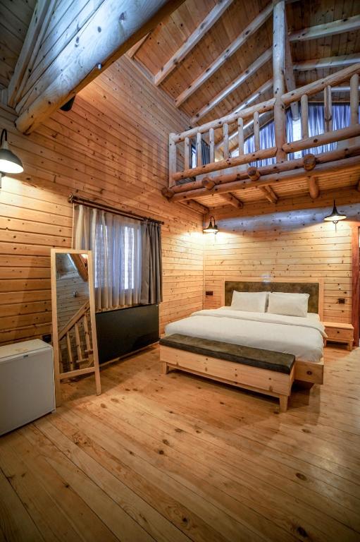 Postel nebo postele na pokoji v ubytování Pino Mar Luxury Bungalows