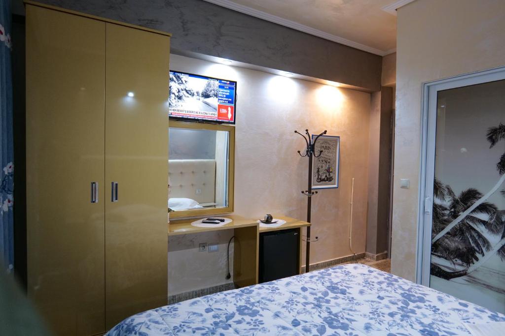 Postel nebo postele na pokoji v ubytování Hotel Lindi