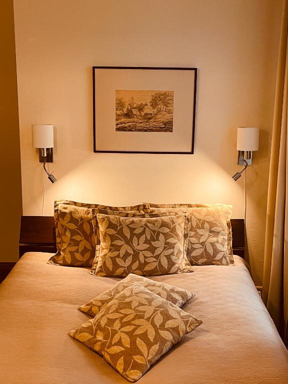 Postel nebo postele na pokoji v ubytování Hotel Vilhelmine
