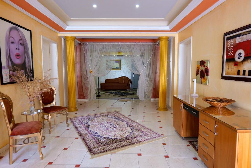 Postel nebo postele na pokoji v ubytování Hotel Lindi