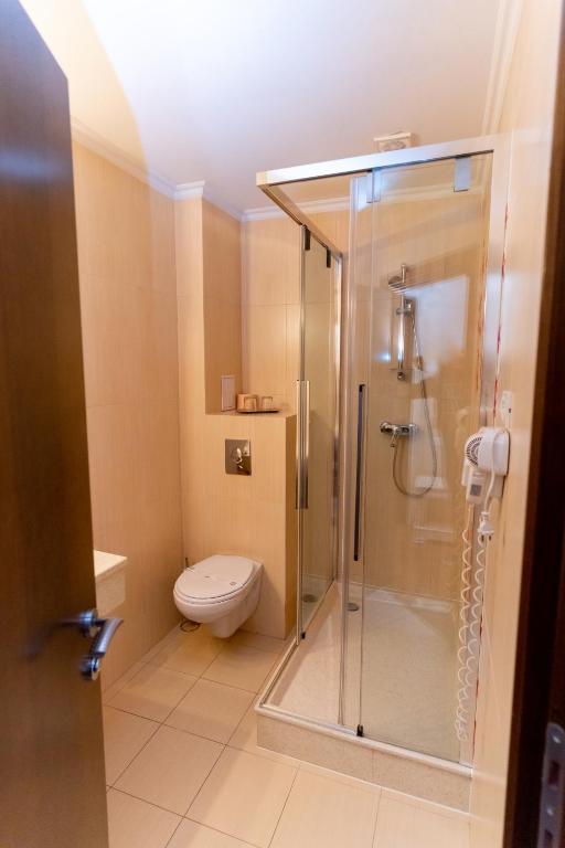 Koupelna v ubytování Acapulco Hotel