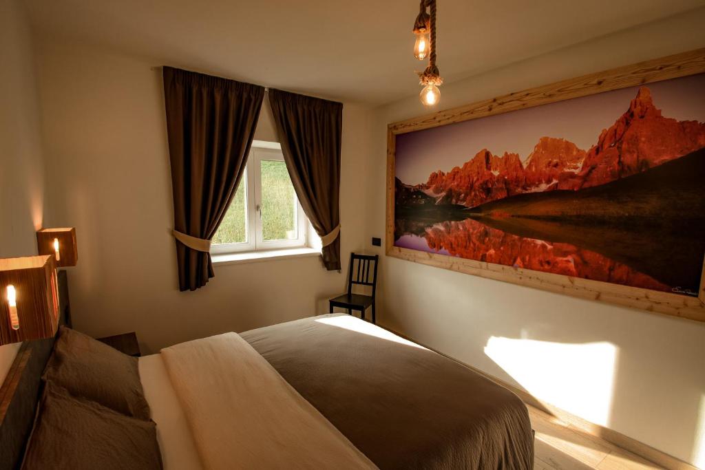 Postel nebo postele na pokoji v ubytování Alpenrooms