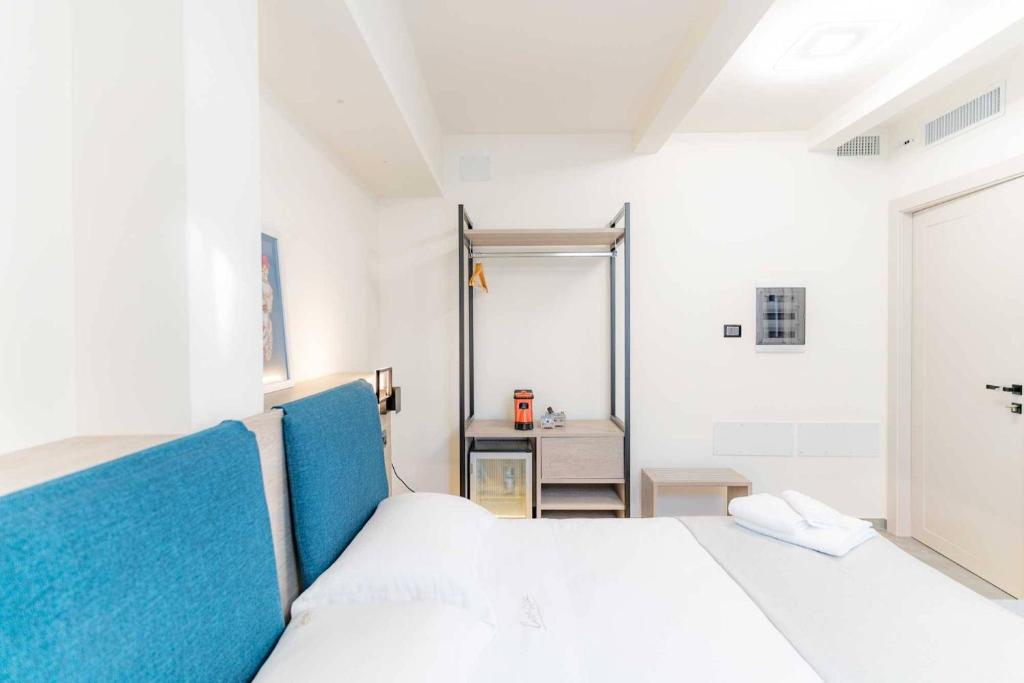 Postel nebo postele na pokoji v ubytování Carizza Rooms