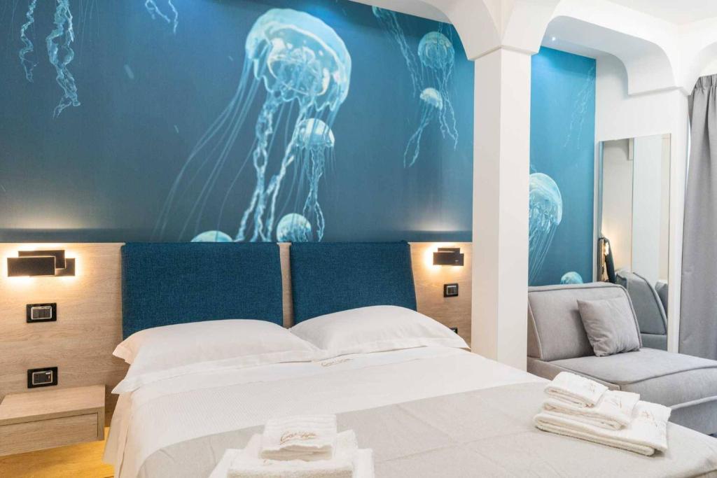 Postel nebo postele na pokoji v ubytování Carizza Rooms