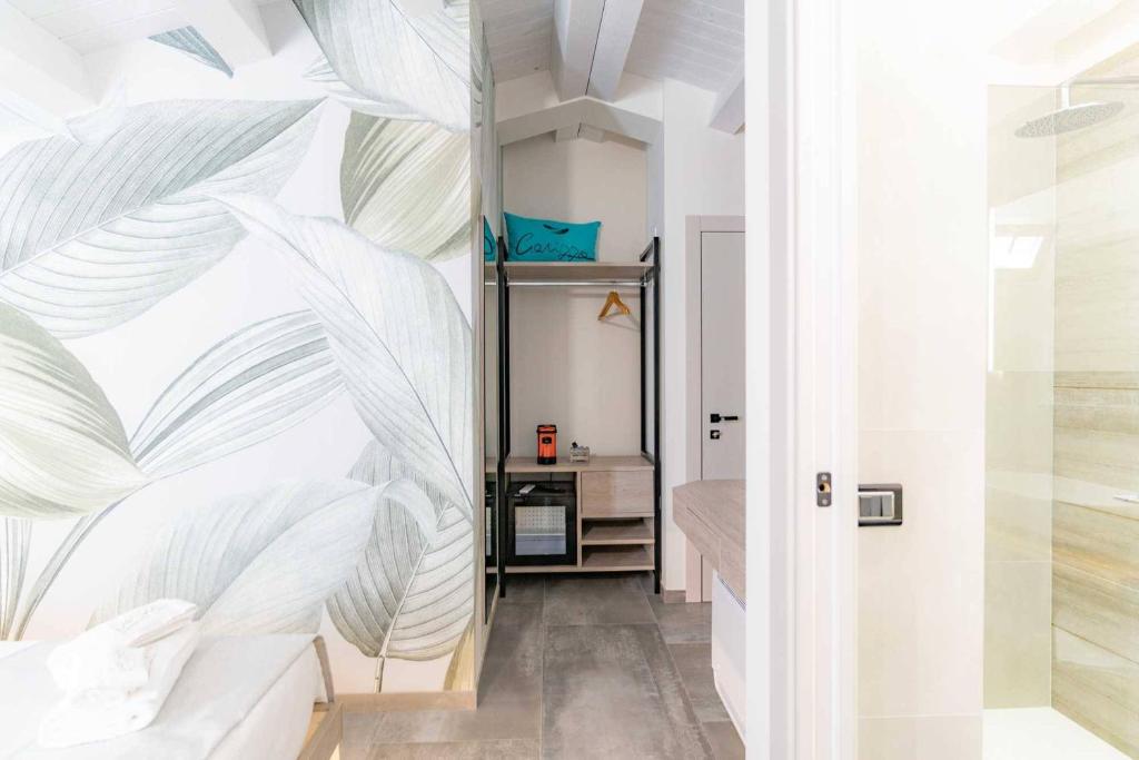 Postel nebo postele na pokoji v ubytování Carizza Rooms
