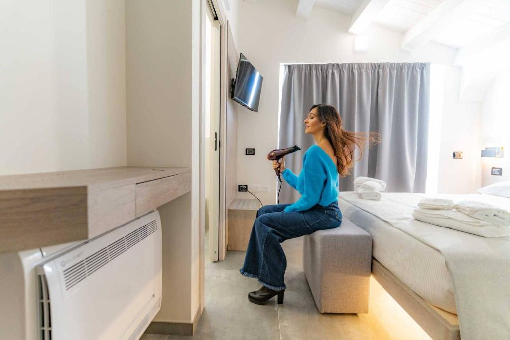 TV a/nebo společenská místnost v ubytování Carizza Rooms