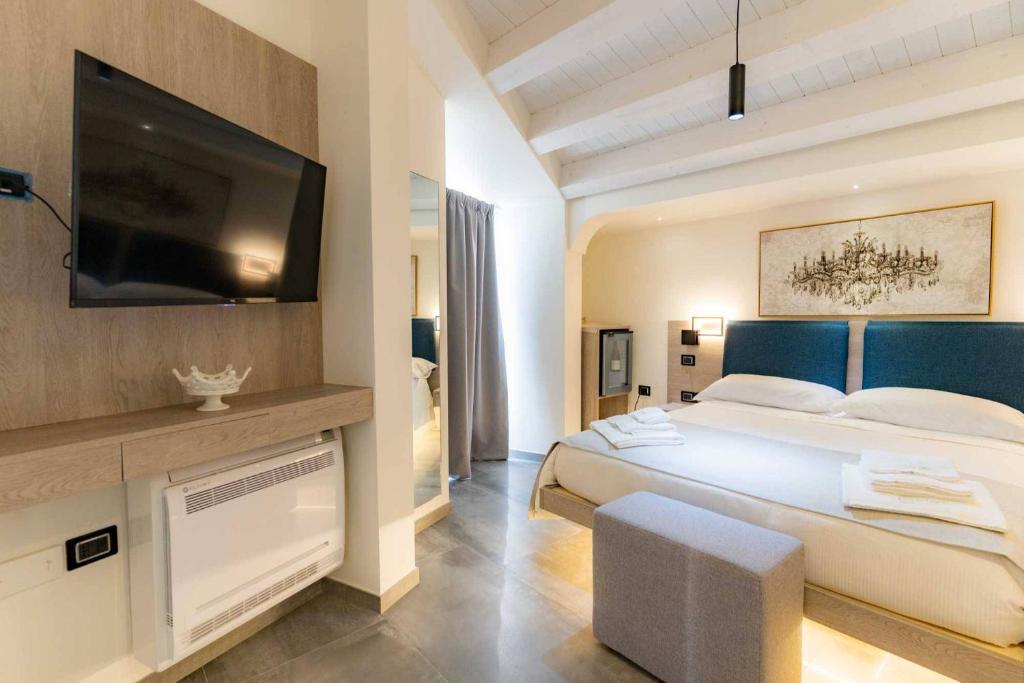 Postel nebo postele na pokoji v ubytování Carizza Rooms