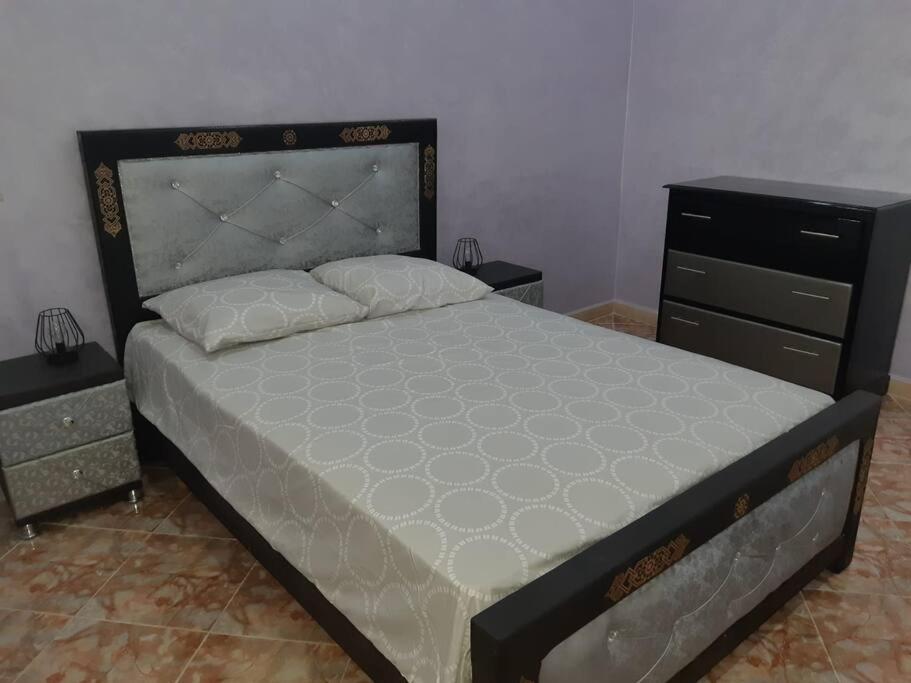 Postel nebo postele na pokoji v ubytování VILLA MODERNE