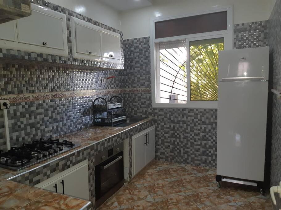 Kuchyň nebo kuchyňský kout v ubytování VILLA MODERNE