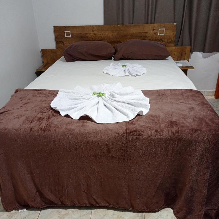 Postel nebo postele na pokoji v ubytování Pousada da Maira