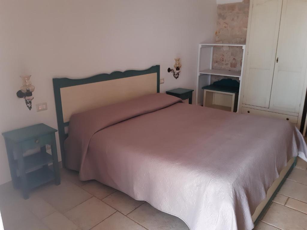 Postel nebo postele na pokoji v ubytování B&B Il Mulino del Monastero