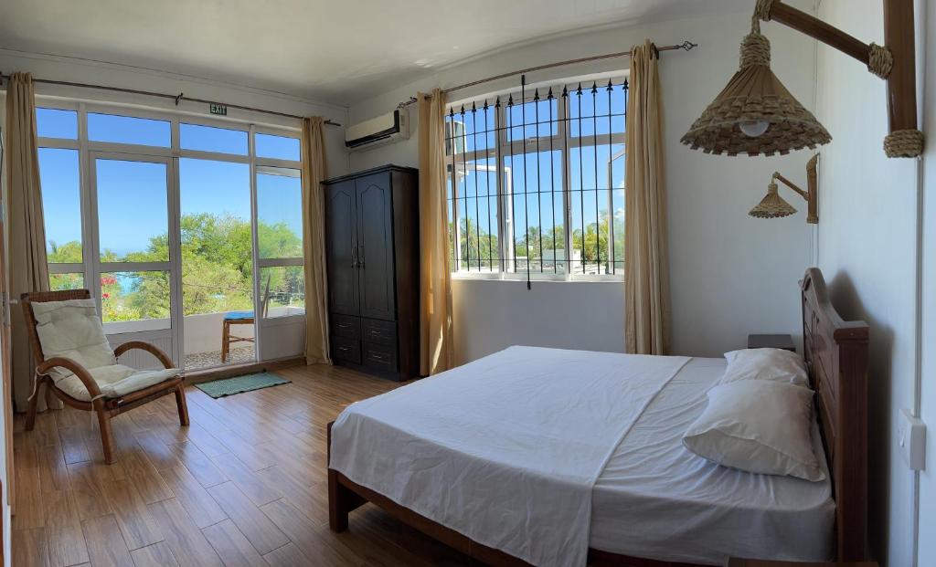 Postel nebo postele na pokoji v ubytování Suntoo Villa Wind & Kitesurf Accommodation